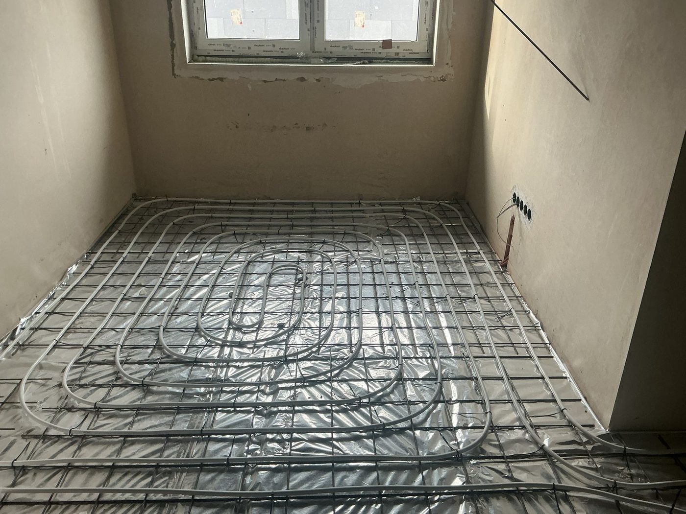 Padlófűtés szobában